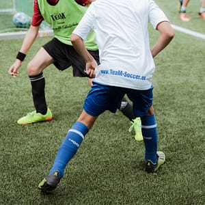 Team-Soccer - sportlicher Zweikampf